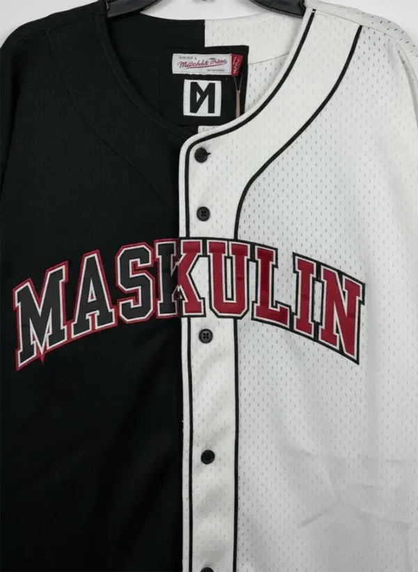 Close-up of asymmetric mesh and fabric split on athletic t-shirt