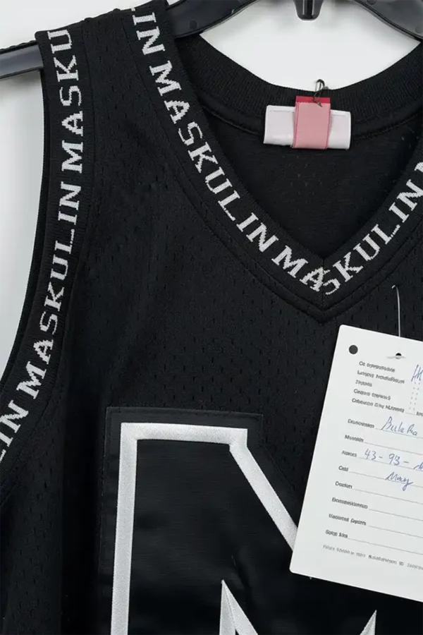 Close-up of soft cotton fabric texture showing breathable weave on essential tank top