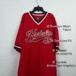 sport-tee-breathable-fabric-moisture-wicking-red Close-up of moisture-wicking breathable fabric texture on sport t-shirt